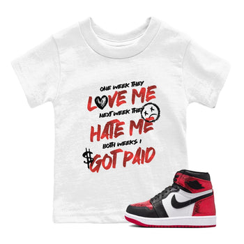 I Got Paid baby and kids t-shirt crafted for little sneakerheads to shine with the Air Jordan 1 Ruby sneakers, displayed in White 1.