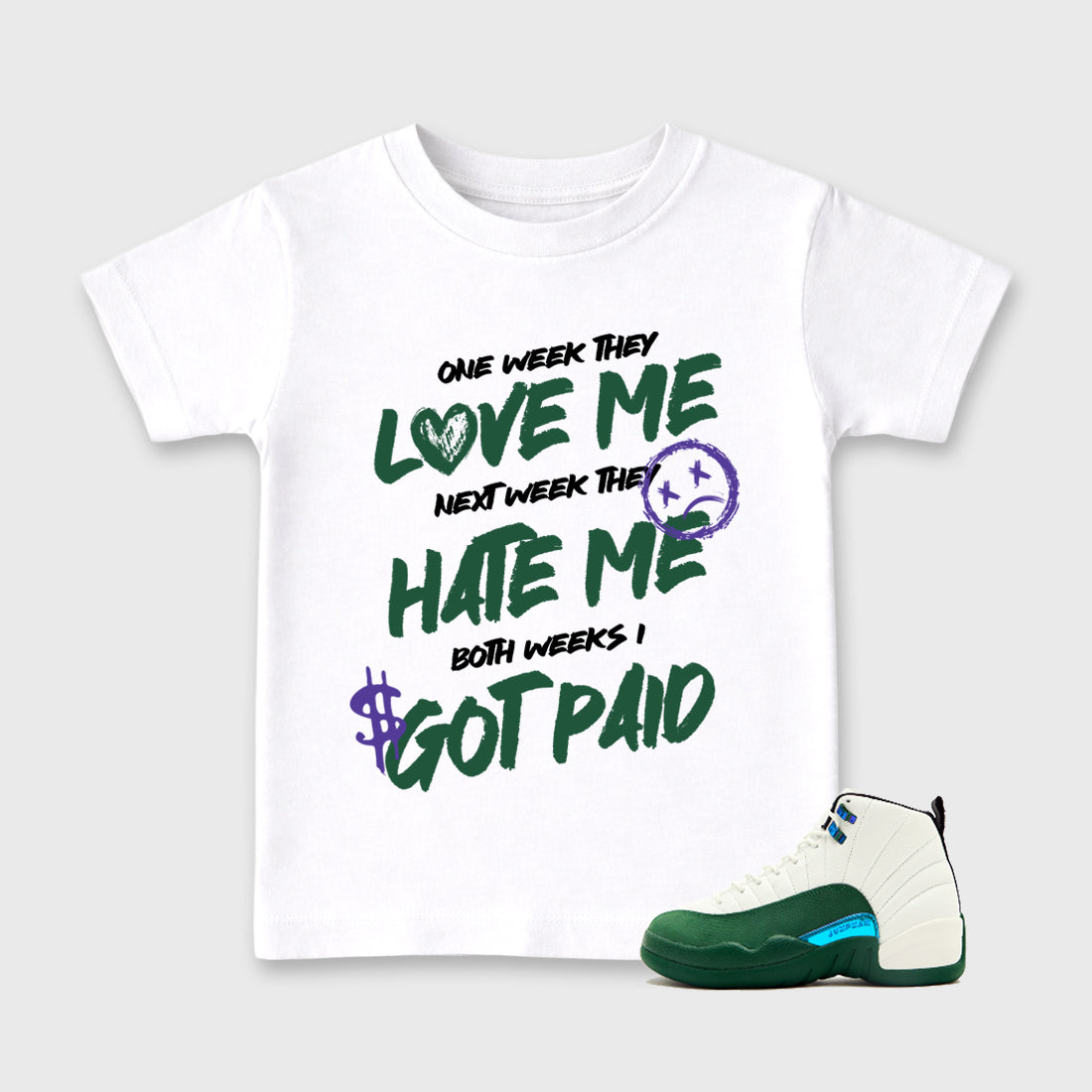 I Got Paid Baby & Kids Graphic T-Shirt featuring original artwork designed to match the Air Jordan 12 Bucks. White 1 Kids Graphic Tee.