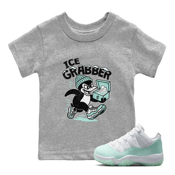 Ice Grabber baby and kids t-shirt crafted for little sneakerheads to shine with the Air Jordan 11 Igloo sneakers, displayed in Heather Grey 1.