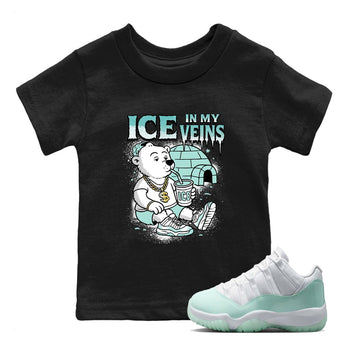 Ice In My Veins baby and kids t-shirt crafted for little sneakerheads to shine with the Air Jordan 11 Igloo sneakers, displayed in Black 1.