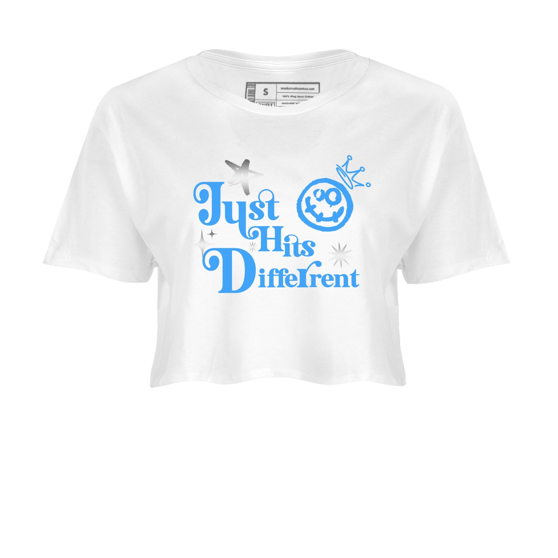 Just Hits Different womens crop tee made to vibe with the Air Jordan 12 White and University Blue sneakers — the perfect match in White 2.