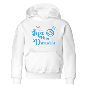 Just Hits Different baby and kids t-shirt crafted for little sneakerheads to shine with the Air Jordan 12 White and University Blue sneakers, displayed in White 2.