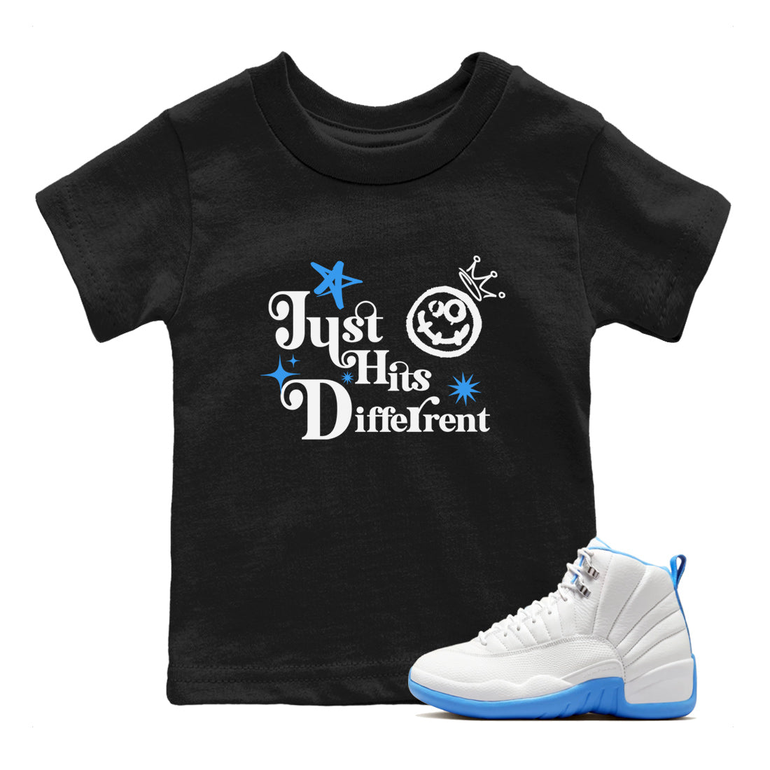 Just Hits Different baby and kids t-shirt crafted for little sneakerheads to shine with the Air Jordan 12 White and University Blue sneakers, displayed in Black 1.