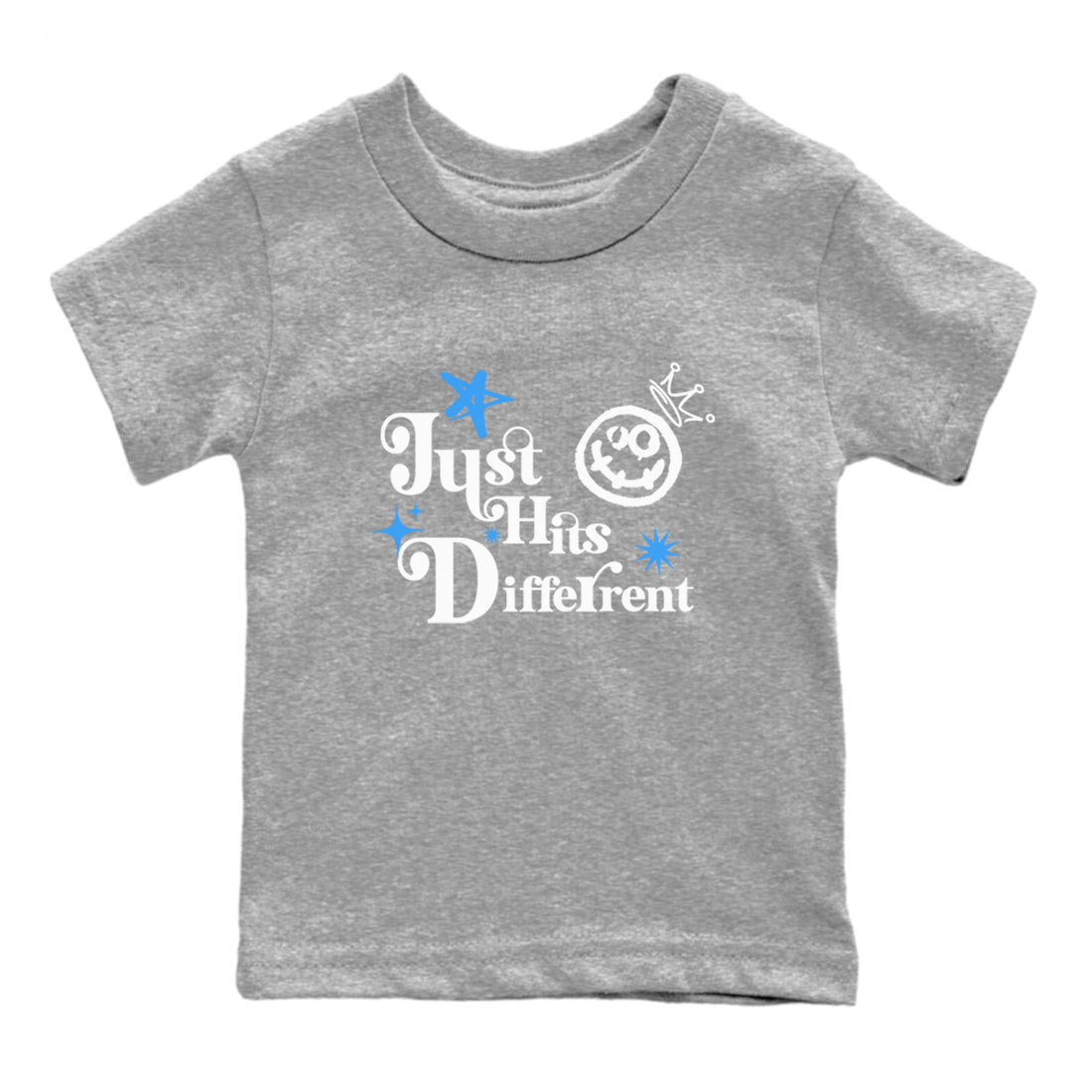 Just Hits Different baby and kids t-shirt crafted for little sneakerheads to shine with the Air Jordan 12 White and University Blue sneakers, displayed in Heather Grey 2.