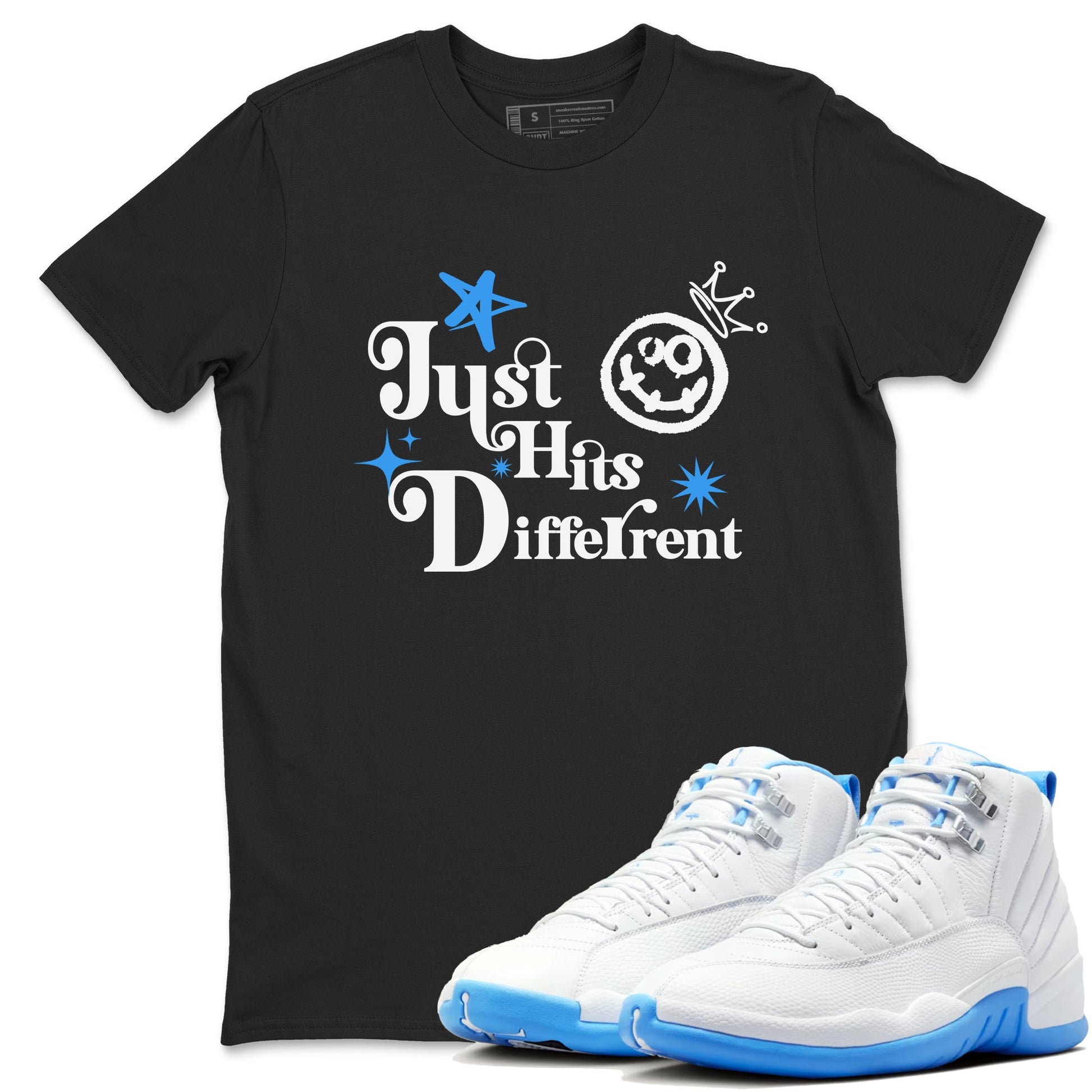 Just Hits Different sneaker match t-shirt styled to complete your fit with the Air Jordan 12 White and University Blue sneakers, shown in Black 1.