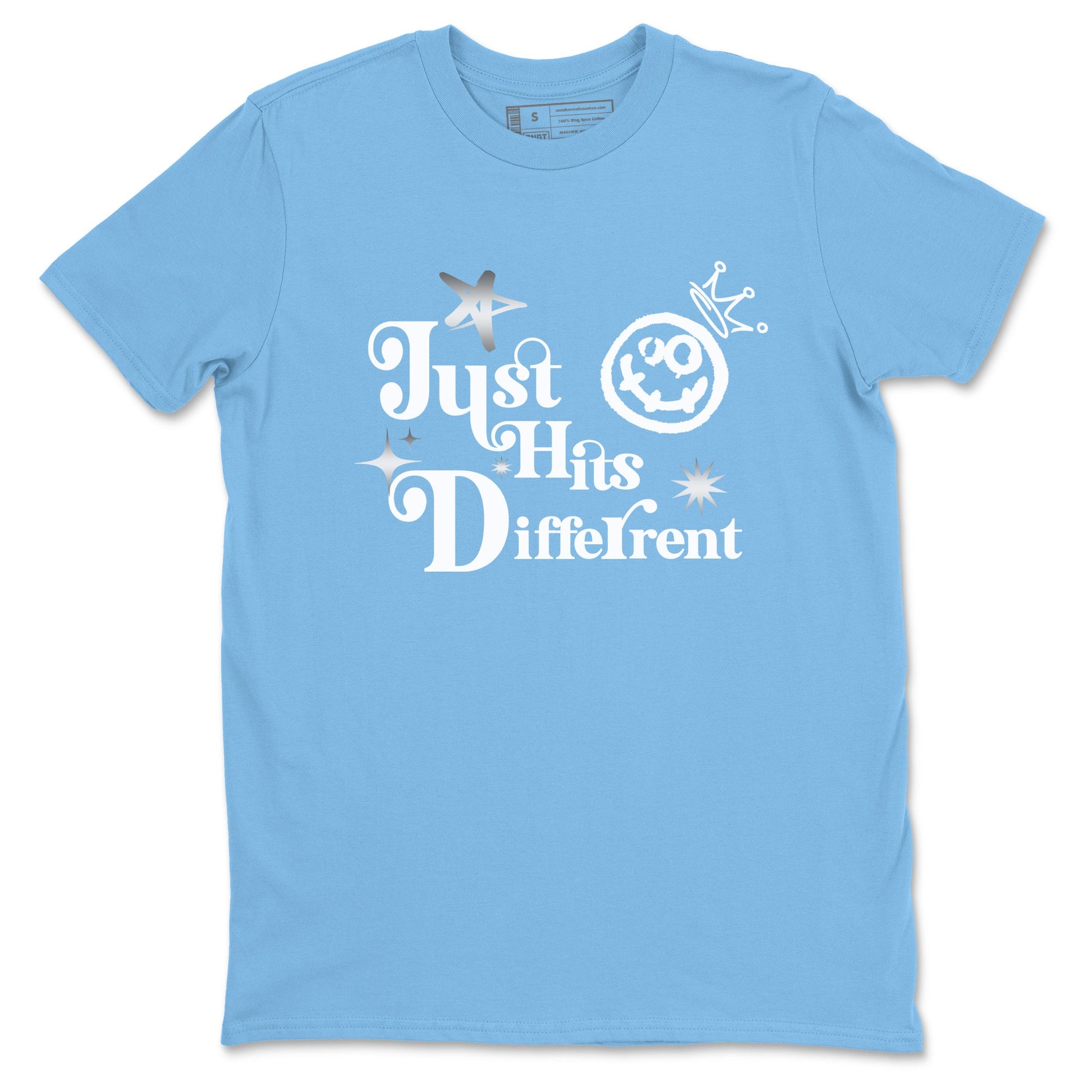 Just Hits Different sneaker match t-shirt styled to complete your fit with the Air Jordan 12 White and University Blue sneakers, shown in Carolina Blue 2.