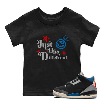 Just Hits Different baby and kids t-shirt crafted for little sneakerheads to shine with the Air Jordan 3 Rare Air sneakers, displayed in Black 1.
