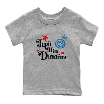 Just Hits Different baby and kids t-shirt crafted for little sneakerheads to shine with the Air Jordan 3 Rare Air sneakers, displayed in Heather Grey 2.