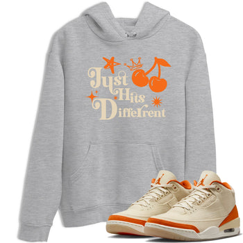 Just Hits Different sneaker match t-shirt styled to complete your fit with the Air Jordan 3 Starfish sneakers, shown in Heather Grey 1.