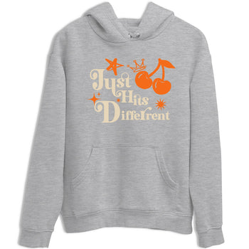Just Hits Different sneaker match t-shirt styled to complete your fit with the Air Jordan 3 Starfish sneakers, shown in Heather Grey 2.