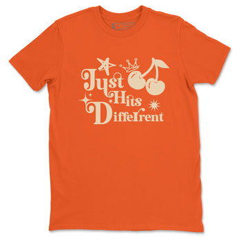 Just Hits Different sneaker match t-shirt styled to complete your fit with the Air Jordan 3 Starfish sneakers, shown in Orange 2.