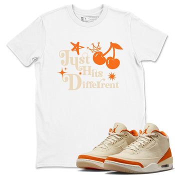 Just Hits Different sneaker match t-shirt styled to complete your fit with the Air Jordan 3 Starfish sneakers, shown in White 1.