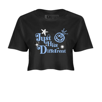 Just Hits Different womens crop tee made to vibe with the Air Jordan 4 Aluminum sneakers — the perfect match in Black 2.