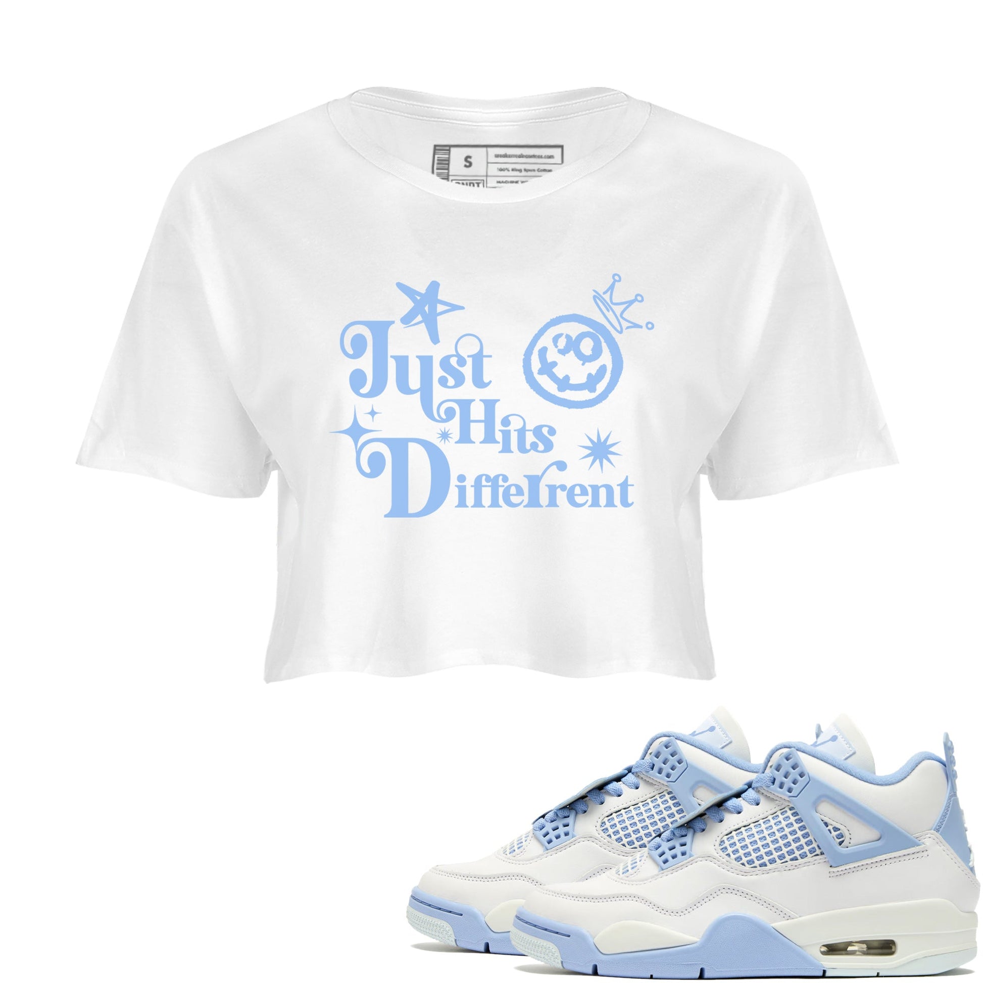 Just Hits Different womens crop tee made to vibe with the Air Jordan 4 Aluminum sneakers — the perfect match in White 1.