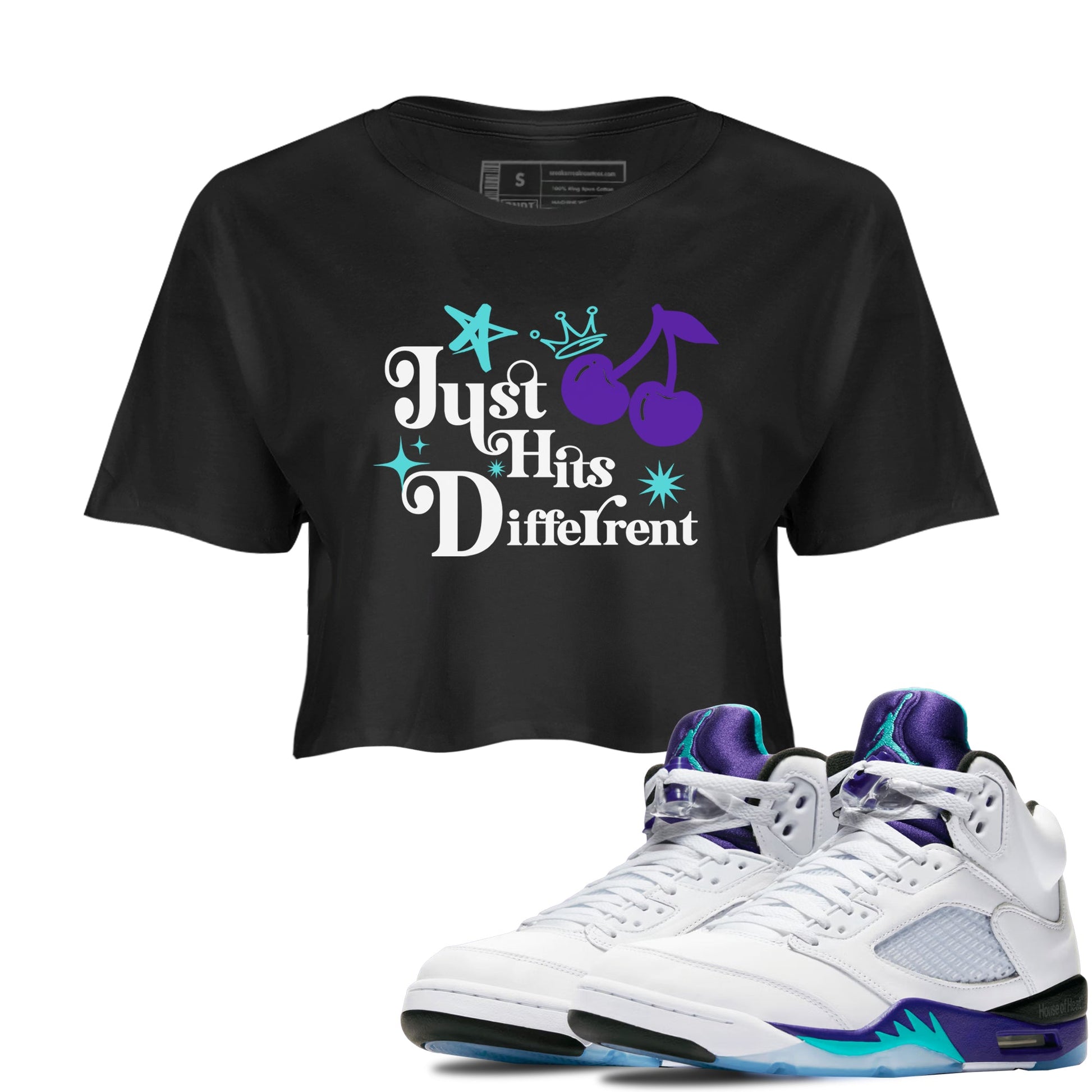 Just Hits Different womens crop tee made to vibe with the Air Jordan 5 Grape sneakers — the perfect match in Black 1.
