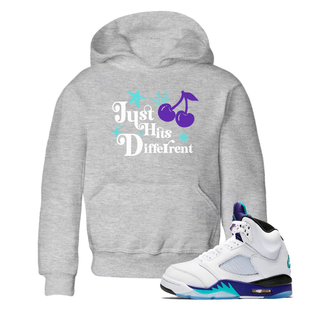 Just Hits Different baby and kids t-shirt crafted for little sneakerheads to shine with the Air Jordan 5 Grape sneakers, displayed in Heather Grey 1.