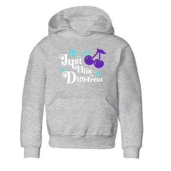 Just Hits Different baby and kids t-shirt crafted for little sneakerheads to shine with the Air Jordan 5 Grape sneakers, displayed in Heather Grey 2.