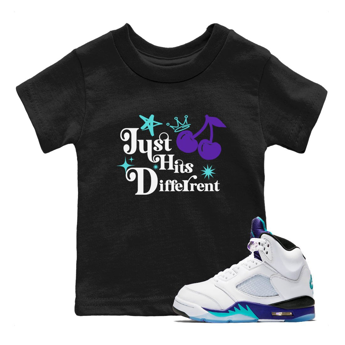Just Hits Different baby and kids t-shirt crafted for little sneakerheads to shine with the Air Jordan 5 Grape sneakers, displayed in Black 1.