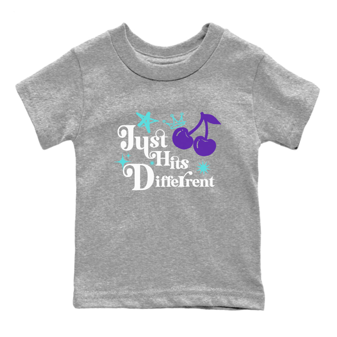 Just Hits Different baby and kids t-shirt crafted for little sneakerheads to shine with the Air Jordan 5 Grape sneakers, displayed in Heather Grey 2.