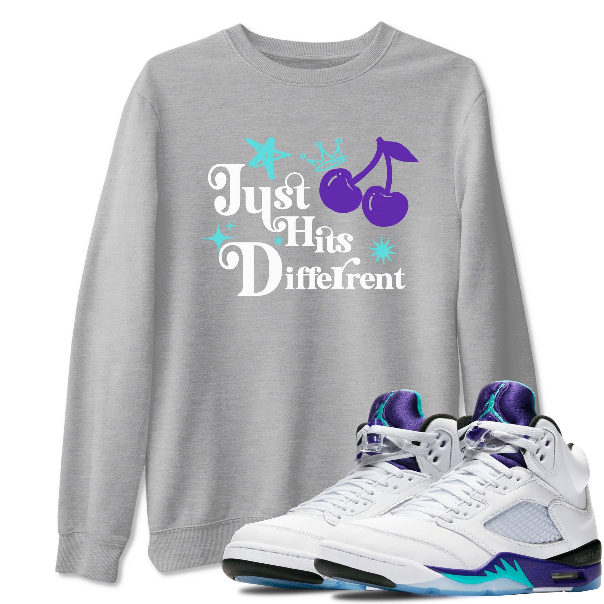 Just Hits Different sneaker match t-shirt styled to complete your fit with the Air Jordan 5 Grape sneakers, shown in Heather Grey 1.
