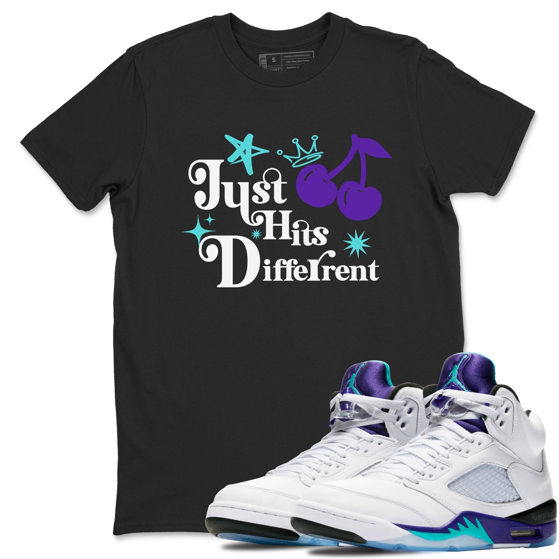 Just Hits Different sneaker match t-shirt styled to complete your fit with the Air Jordan 5 Grape sneakers, shown in Black 1.