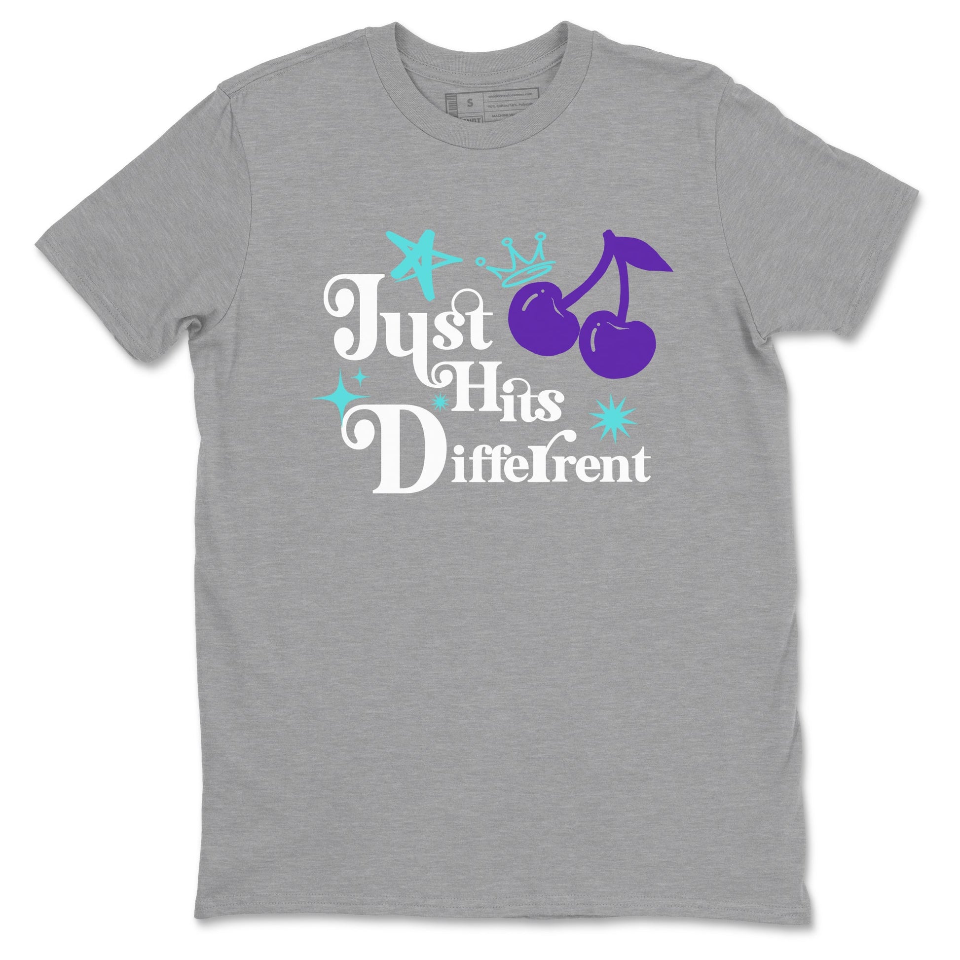 Just Hits Different sneaker match t-shirt styled to complete your fit with the Air Jordan 5 Grape sneakers, shown in Heather Grey 2.