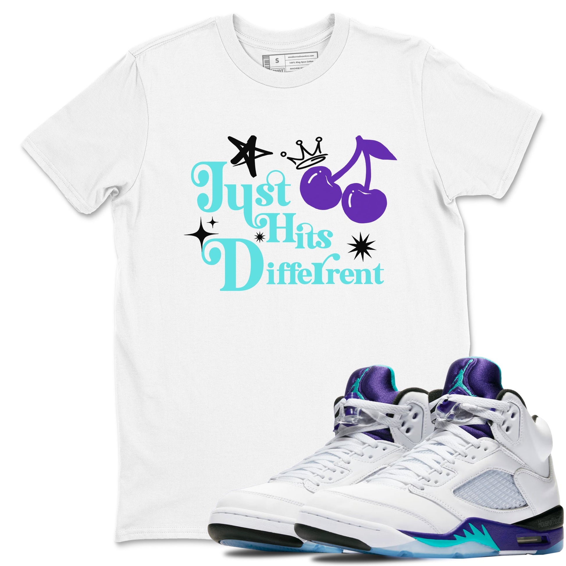Just Hits Different sneaker match t-shirt styled to complete your fit with the Air Jordan 5 Grape sneakers, shown in White 1.