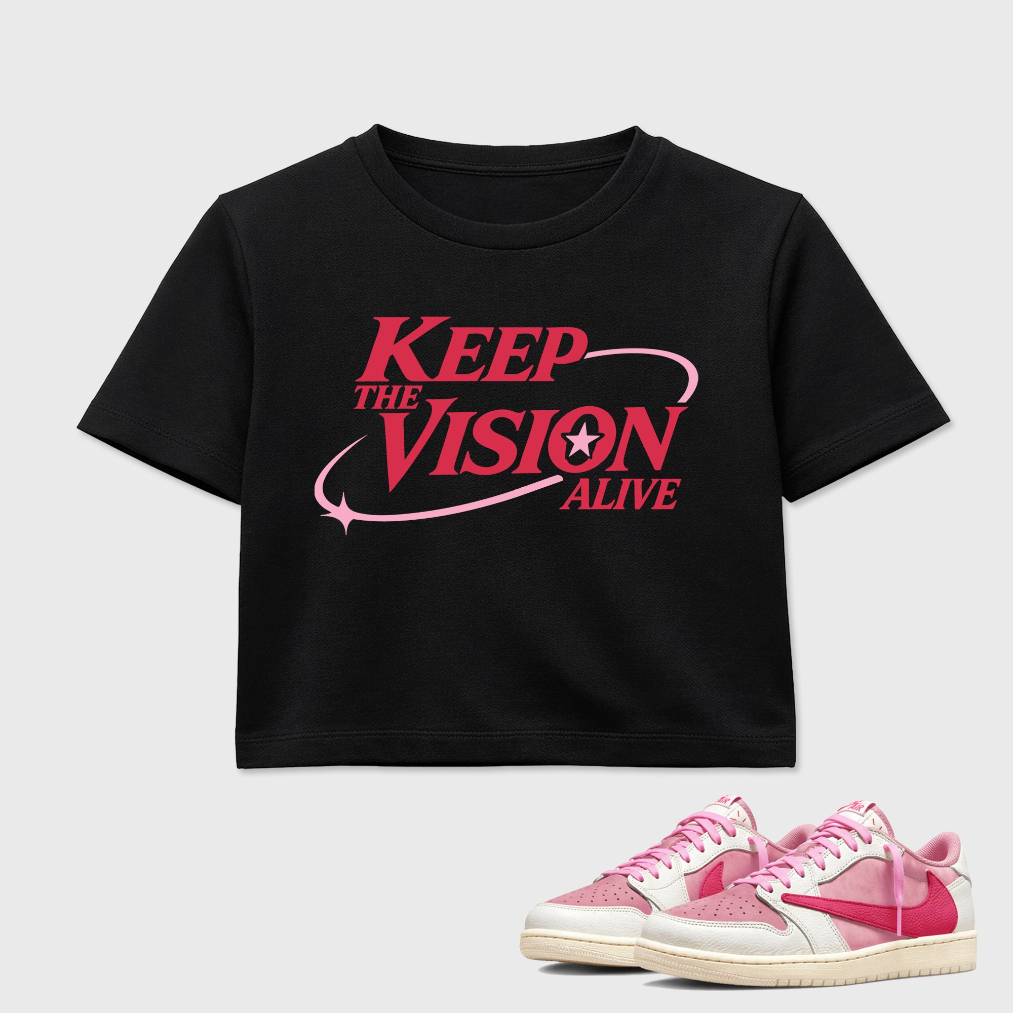 Keep The Vision Alive women’s crop tee designed to match the Air Jordan 1 Travis Scott Tropical Pink, featuring coordinated Black 1 options for a perfect streetwear vibe.