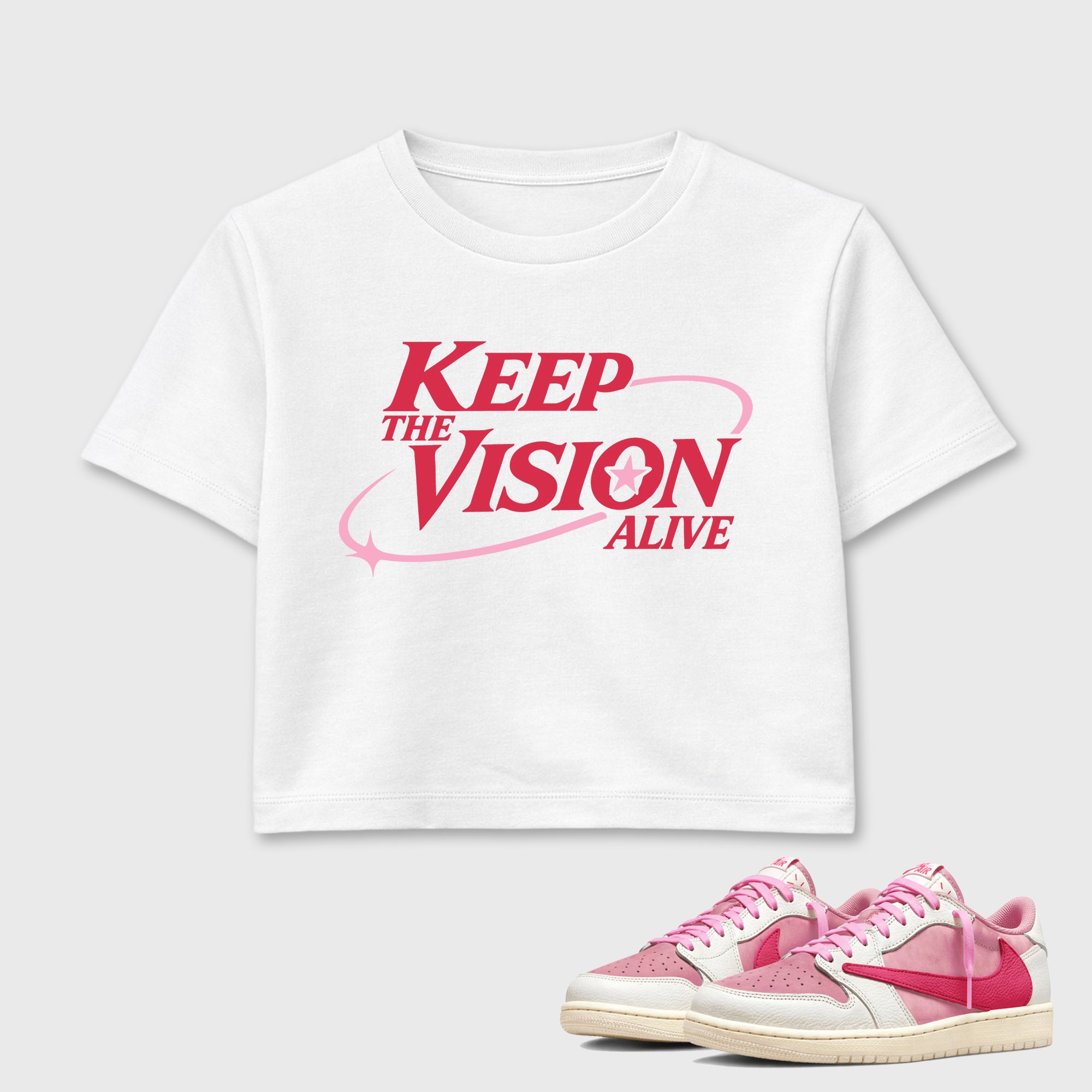 Keep The Vision Alive women’s crop tee designed to match the Air Jordan 1 Travis Scott Tropical Pink, featuring coordinated White 1 options for a perfect streetwear vibe.