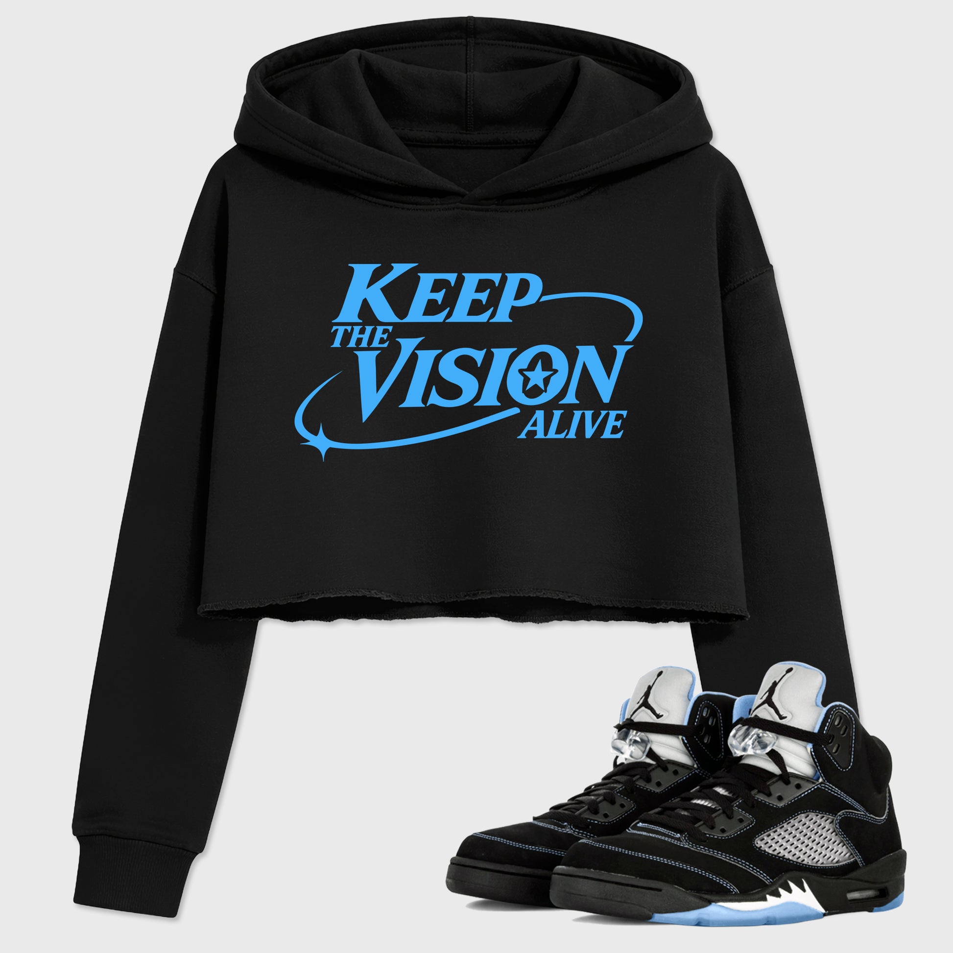 Keep The Vision Alive women’s crop tee designed to match the Air Jordan 5 Black Carolina, featuring coordinated Black 1 options for a perfect streetwear vibe.
