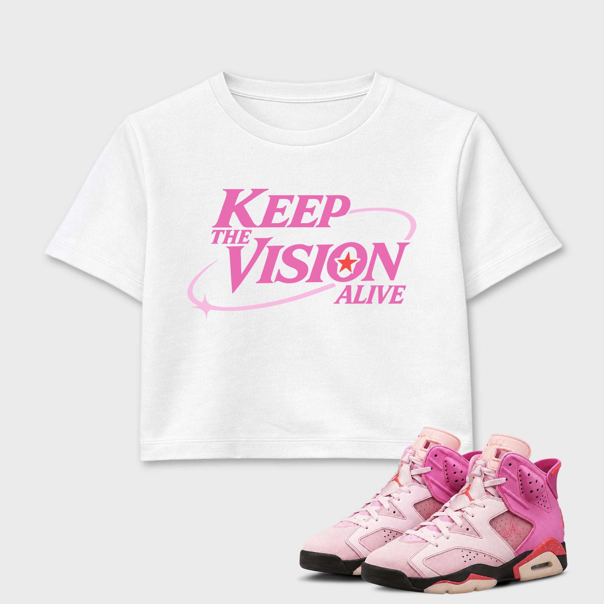 Keep The Vision Alive women’s crop tee designed to match the Air Jordan 6 Playful Pink, featuring coordinated White 1 options for a perfect streetwear vibe.