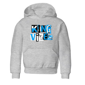 King Vibes baby and kids t-shirt crafted for little sneakerheads to shine with the Air Jordan 12 White and University Blue sneakers, displayed in Heather Grey 2.