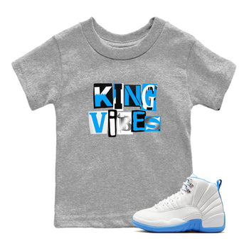 King Vibes baby and kids t-shirt crafted for little sneakerheads to shine with the Air Jordan 12 White and University Blue sneakers, displayed in Heather Grey 1.