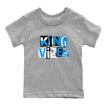 King Vibes baby and kids t-shirt crafted for little sneakerheads to shine with the Air Jordan 12 White and University Blue sneakers, displayed in Heather Grey 2.