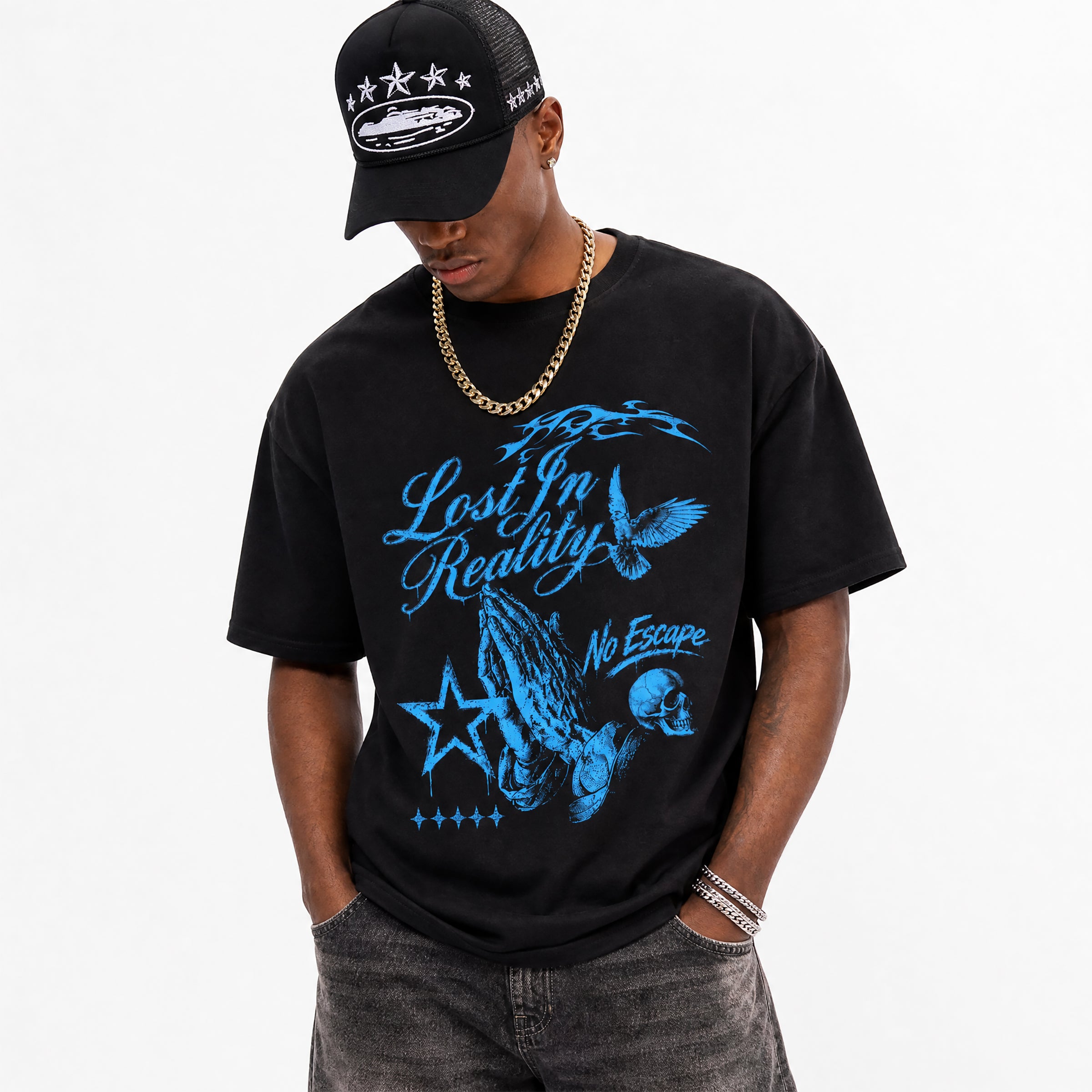 Person wearing a black t-shirt with blue "Lost in Reality" graphics and text, standing against a white background