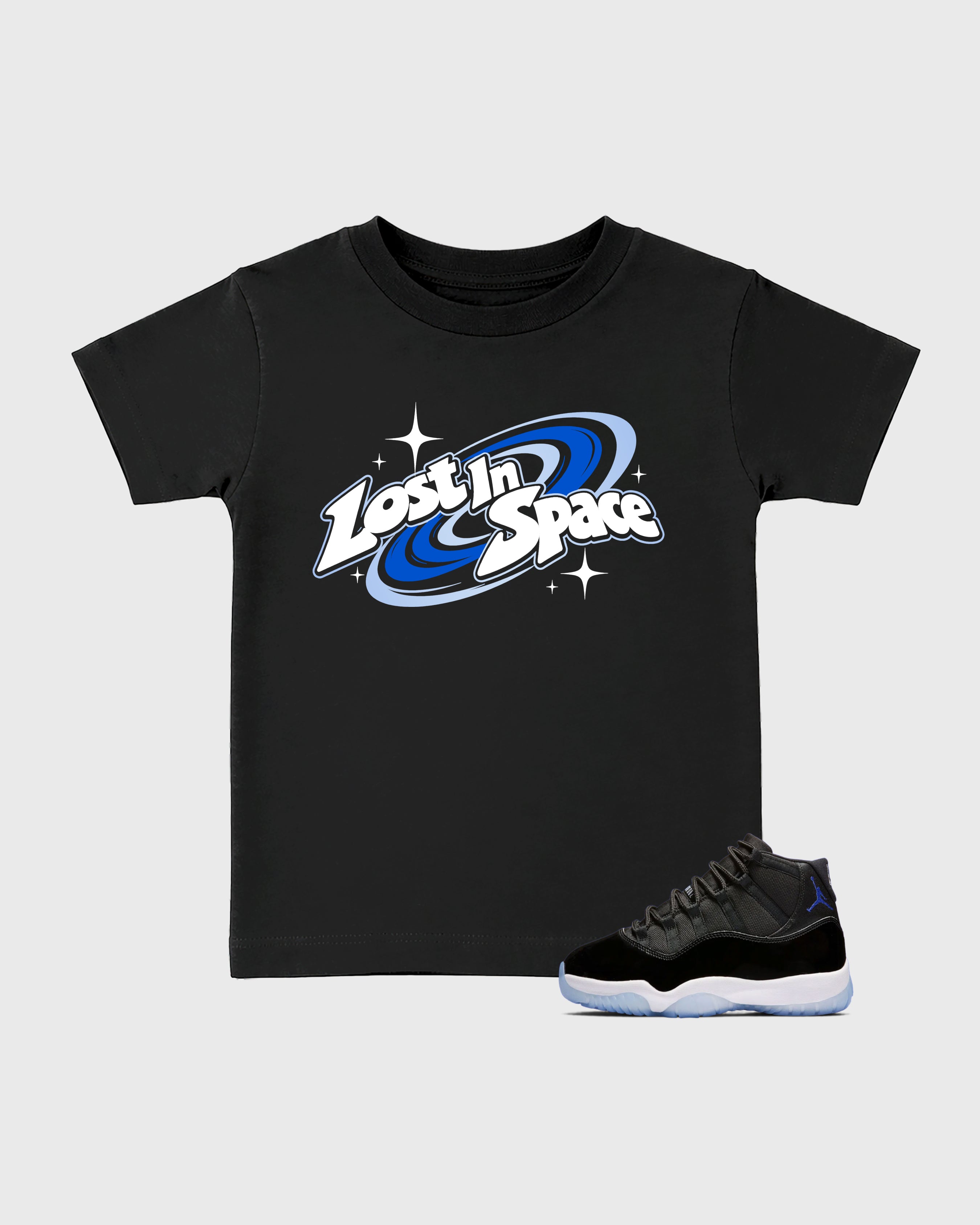 Lost in Space Baby & Kids Graphic T-Shirt featuring original artwork designed to match the Air Jordan 11 Space Jam. Black 1 Kids Graphic Tee.