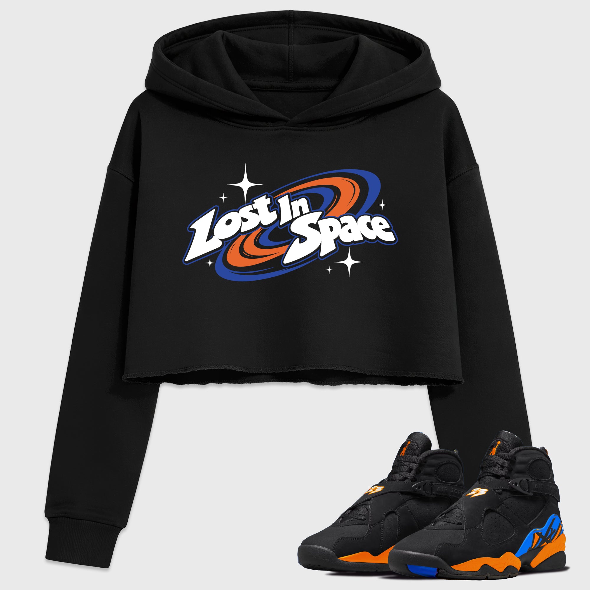 Lost in Space Women’s Graphic Crop Tee featuring original streetwear artwork designed to match the Air Jordan 8 Knicks. Black 1 Crop Tee.
