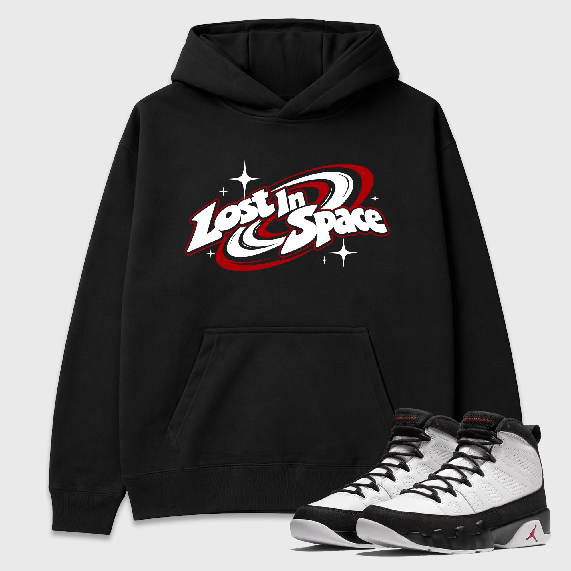 Lost in Space Graphic T-Shirt featuring original streetwear artwork designed to match the Air Jordan 9 True Red. Black 1 Graphic Tee.