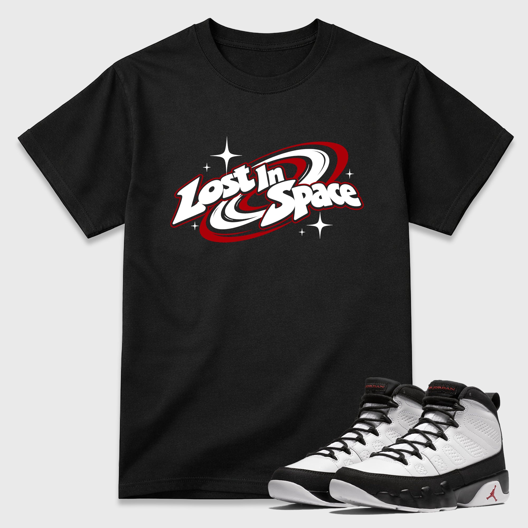Lost in Space Graphic T-Shirt featuring original streetwear artwork designed to match the Air Jordan 9 True Red. Black 1 Graphic T-Shirt.