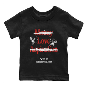 Love Conquers All Things baby and kids t-shirt crafted for little sneakerheads to shine with the Air Jordan 1 Ruby sneakers, displayed in Black 2.