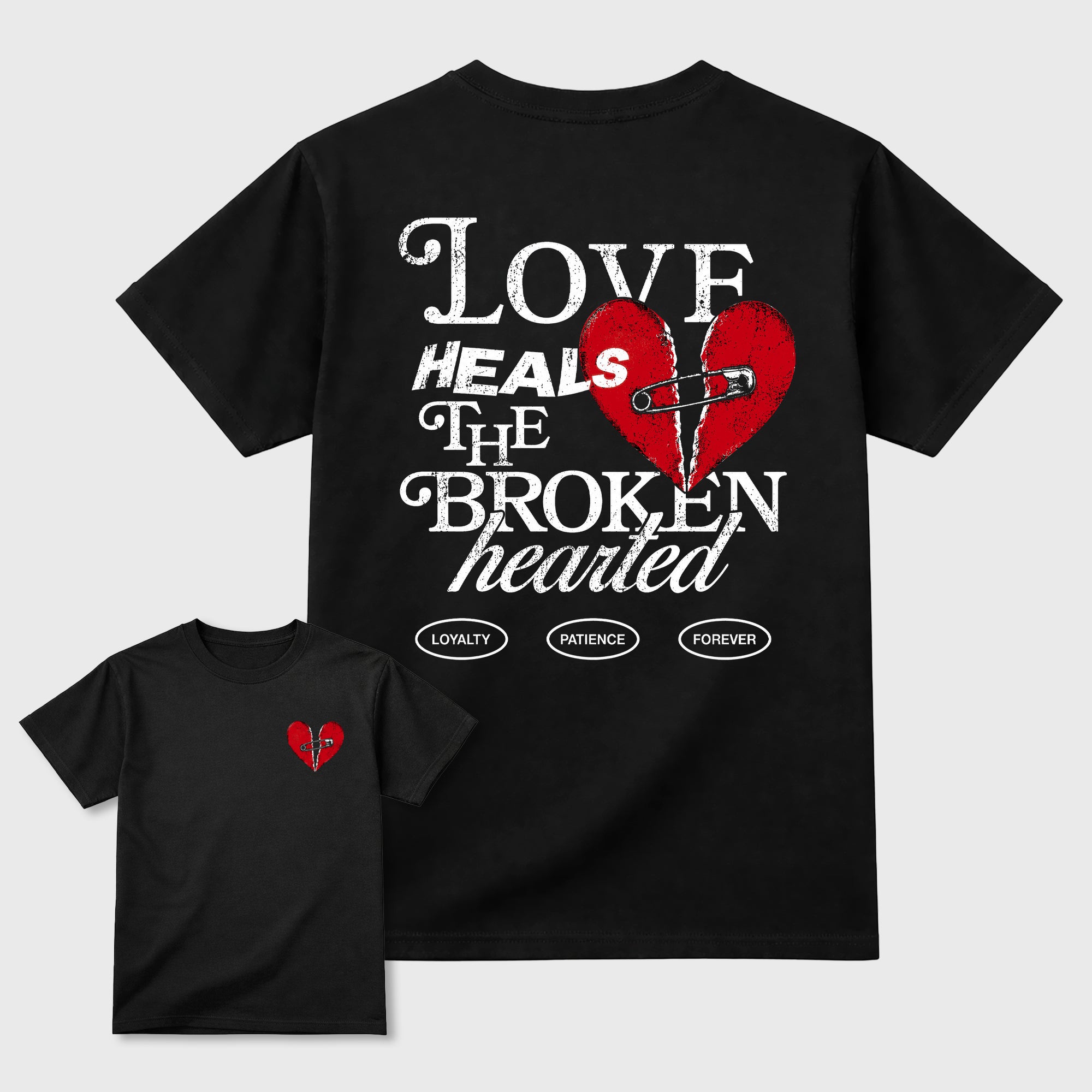 Love Heals Graphic T-Shirt featuring original streetwear artwork designed to match the . Black Graphic T-Shirt.