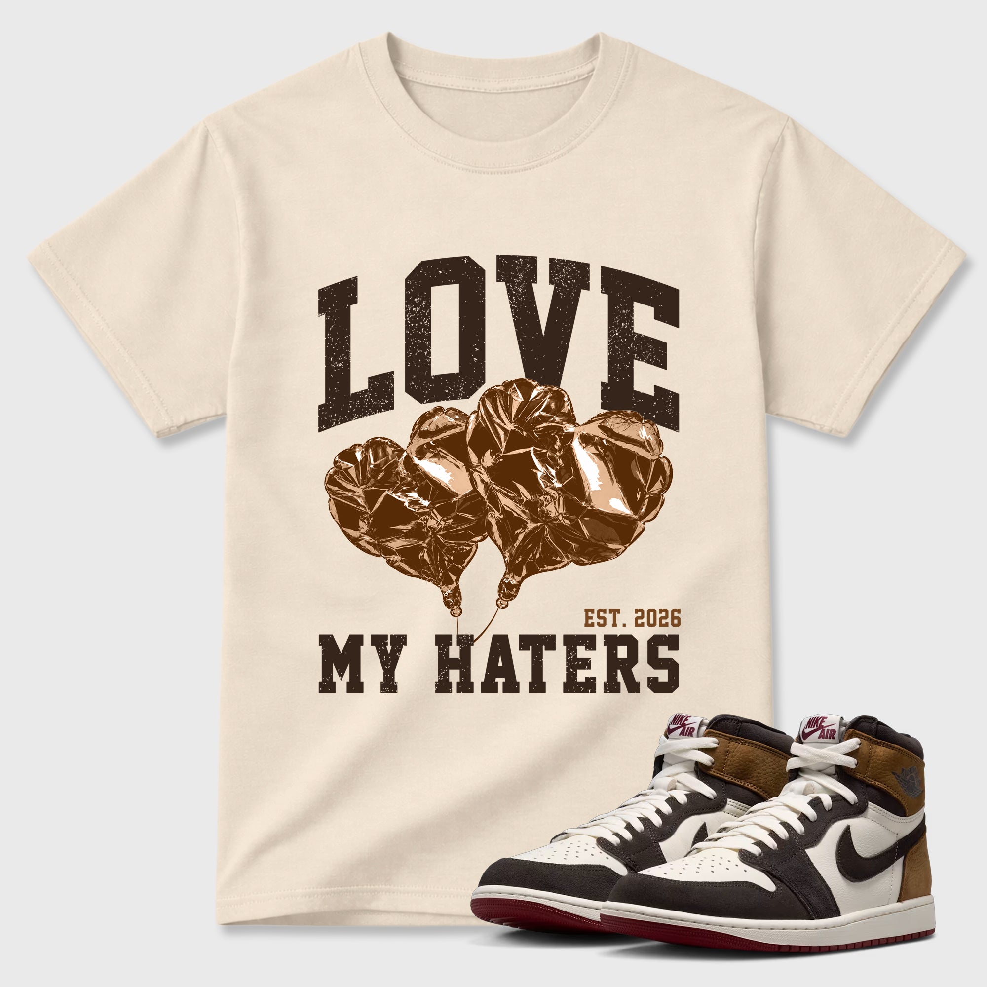Love My Haters Graphic T-Shirt featuring original streetwear artwork designed to match the Air Jordan 1 Love Letter. Natural 1 Graphic T-Shirt.