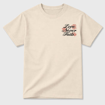 Love Never Fails front and back graphic t-shirt styled to complete your outfit with the4s Nigel Sylvester x Jordan 4 Brick after Brick, shown in Natural.