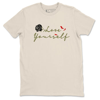 1s Travis Scott Medium Olive shirts to match jordans Love Yourself sneaker match tees Air Jordan 1 Travis Scott Medium Olive match shoes to clothes SNRT Sneaker Tees unisex cotton Natural 2 shirts