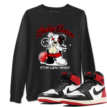1s Black Toe Reimagined shirts to match jordans Lucky Charm best t shirts to wear with jordans AJ1 High OG Black Toe Reimagined match shoes to clothes SNRT Sneaker Tees unisex cotton Black 1 shirts