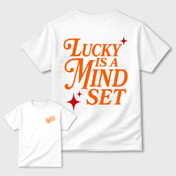 Lucky Is a Mindset graphic t-shirt styled to complete your sneaker outfit with the sneakers, shown in Orange.