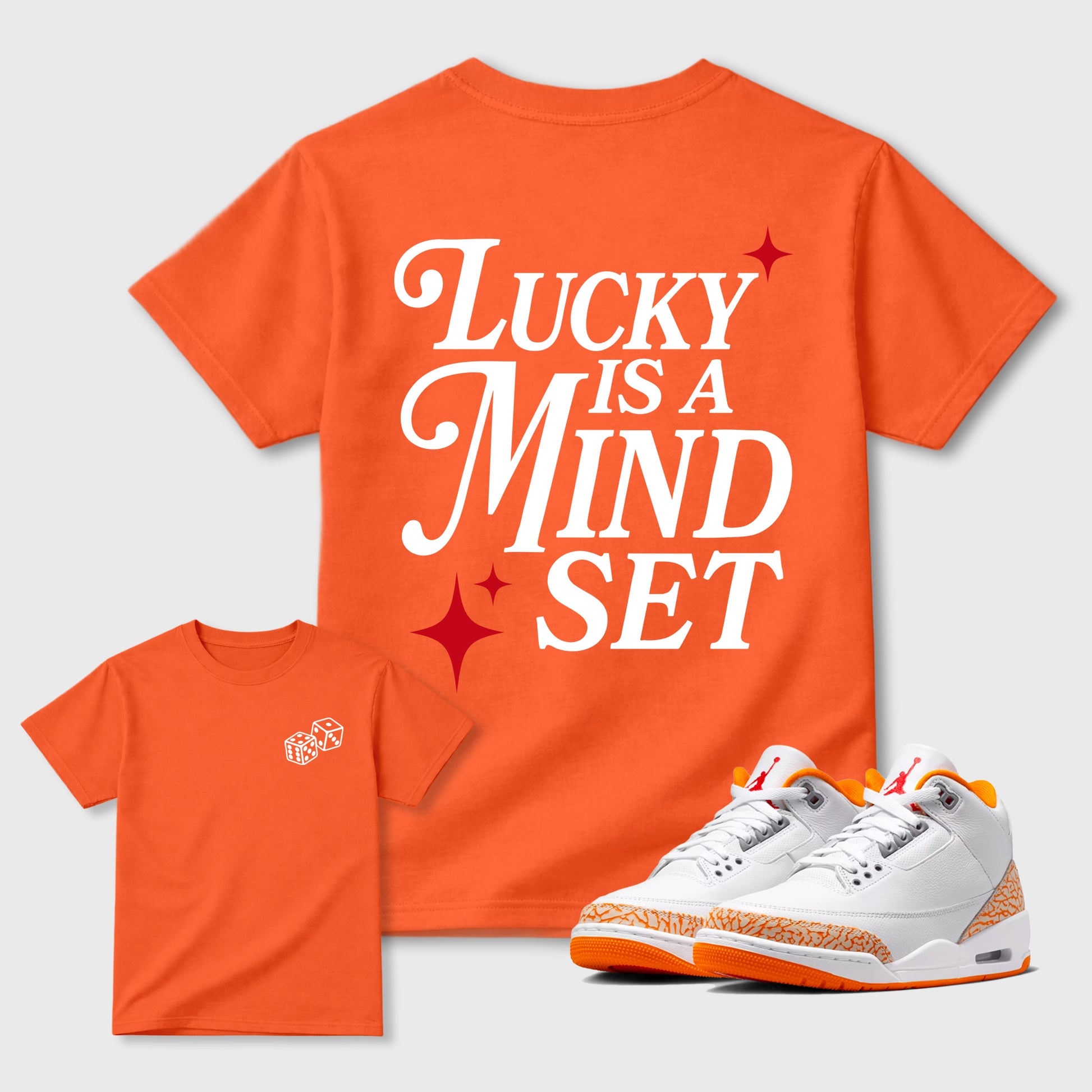 Lucky Is a Mindset graphic t-shirt styled to complete your sneaker outfit with the sneakers, shown in Orange.