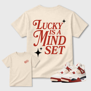 Lucky Is a Mindsetgraphic t-shirt. Streetwear sneakerfit. Sneaker outfit. Complete your fit with the 4s Brick After Brick, shown in Natural.
