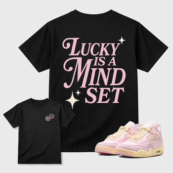 Lucky Is a Mindset graphic t-shirt styled to complete your sneaker outfitwith the AJ4 Iced Carmine, shown in Black.