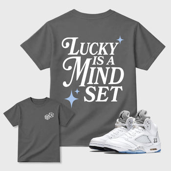 Lucky Is a Mindset front and back graphic t-shirt styled to complete your outfit with the5s White Metallic, shown in Cool Grey.